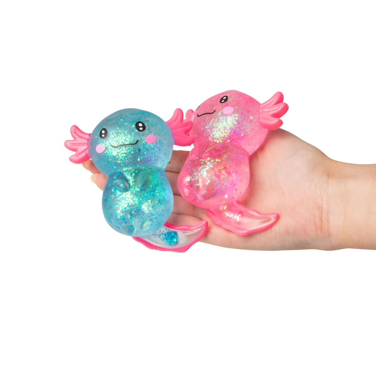 Two colorful axolotl figurines held in a hand against a white background