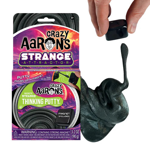 Crazy Aaron's Strange Attractor putty with packaging and a hand holding a piece of putty.