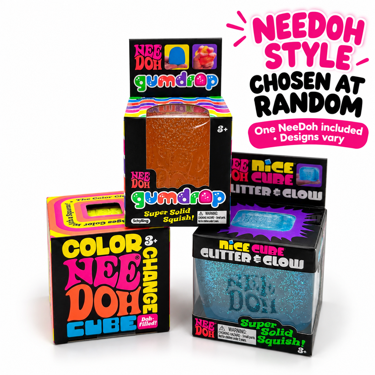 Three boxed NeeDoh style squishy toys displayed on a white background, with promotional text reading 'NEEDOH STYLE CHOSEN AT RANDOM' and 'One NeeDoh included + Designs vary.' The boxes show different color-changing glitter designs: orange-brown, pink/yellow, and blue glitter.