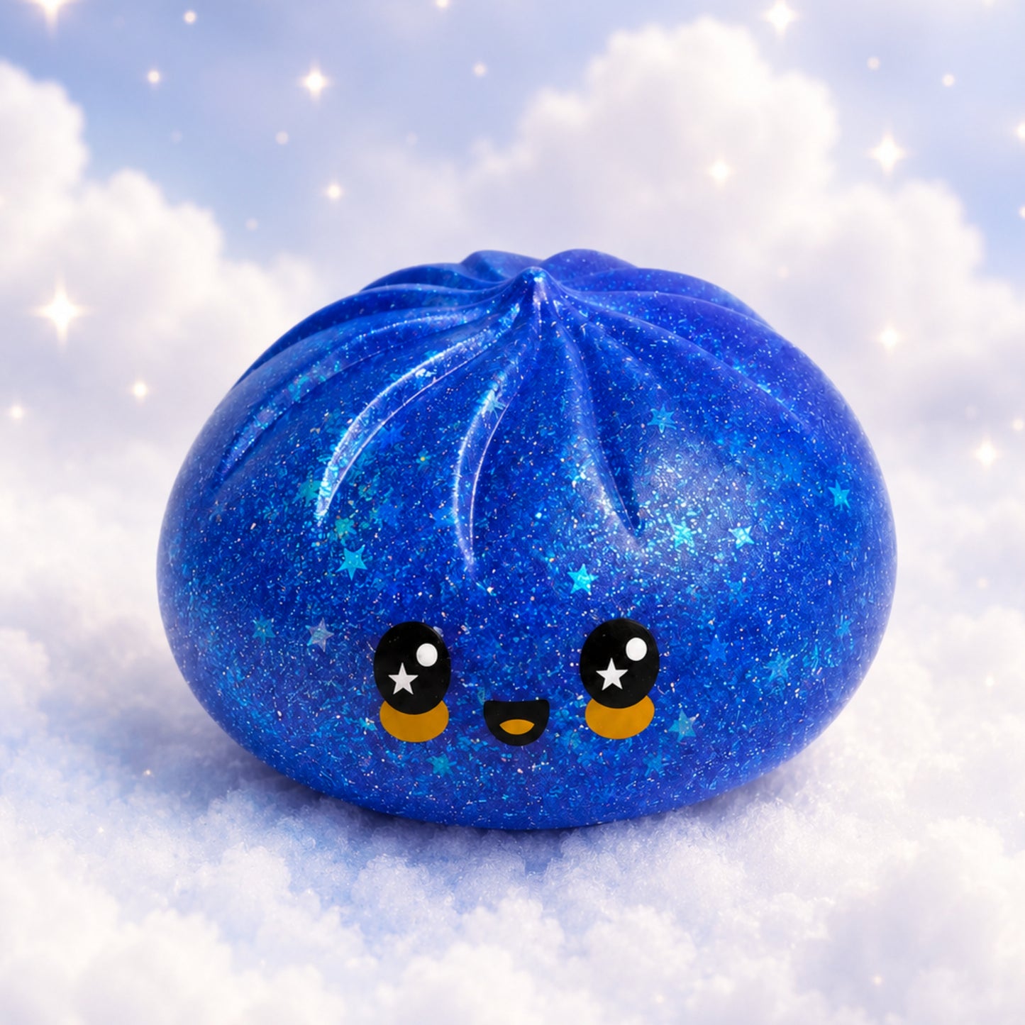 A cute, round blue galaxy-themed squishy toy with a smiling face, set against a fluffy white cloud background with starry sparkles. The text 'Galaxy Edition' is written at the bottom.